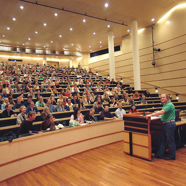 Rutgers Global – Study Abroad Resources for Faculty, professor speaking to students in large lecture hall
