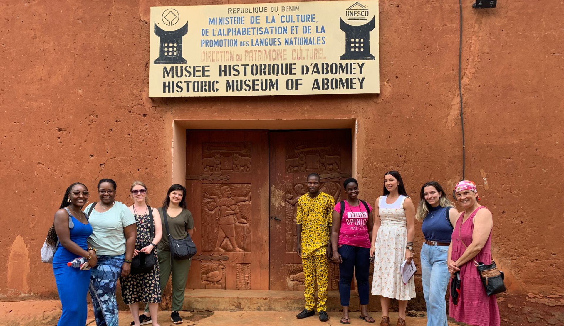 Barbara Cooper and students in Benin