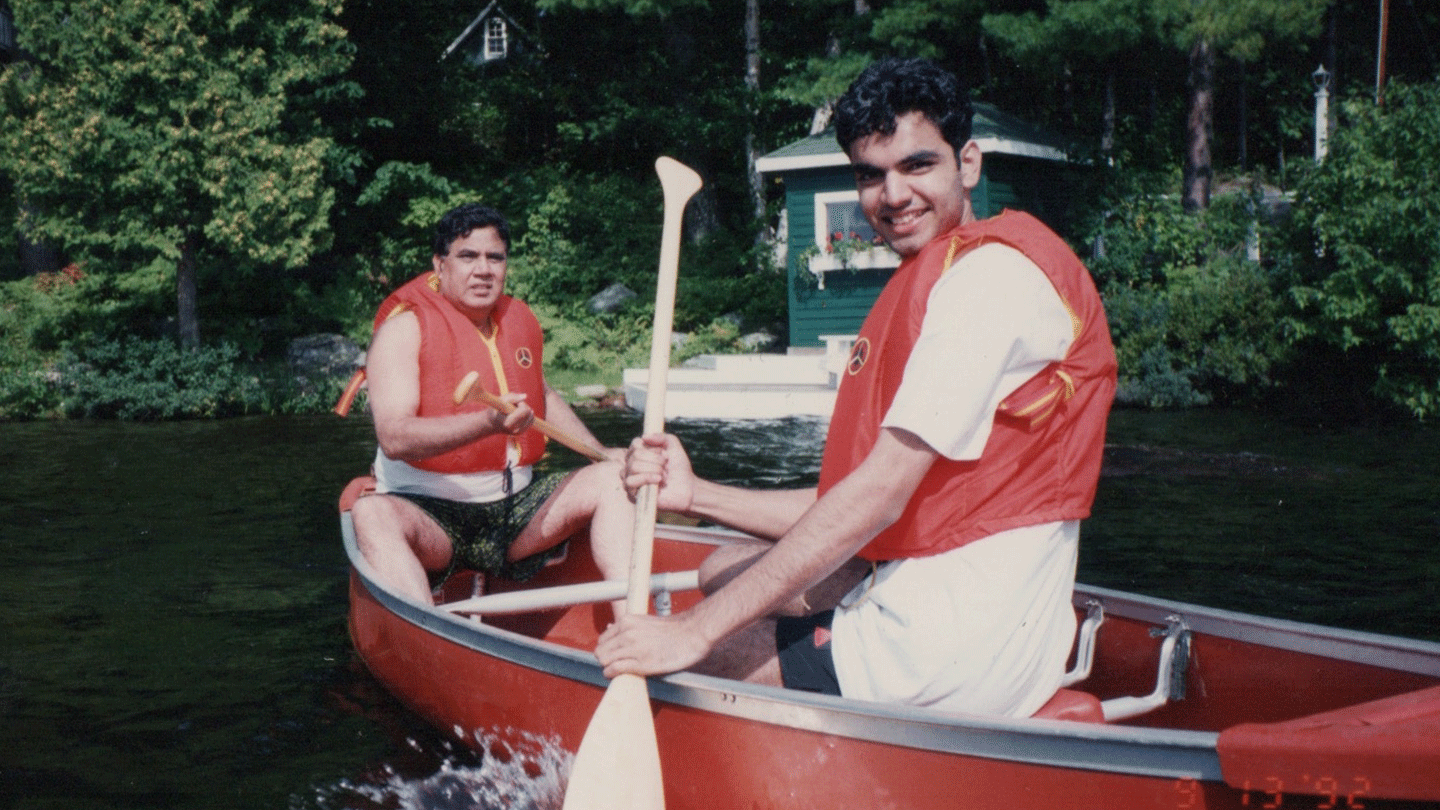 Rutgers Global - ABU: Father Film Screening, father and son in a canoe on a lake