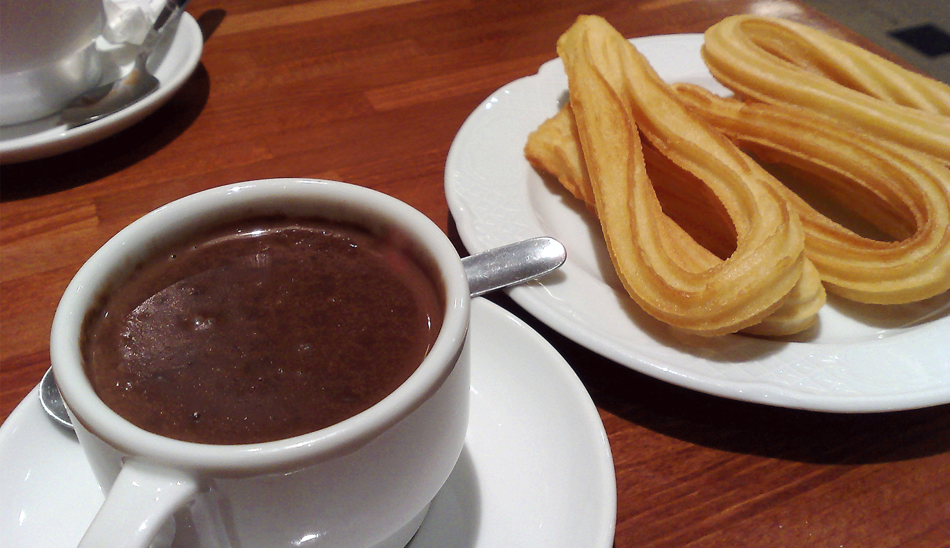 Rutgers Global - Hot chocolate and churros on a table