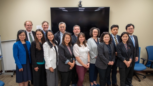 Group photo of Rutgers faculty engaging with National Taipei University