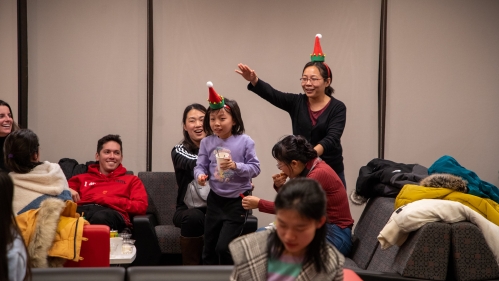 Rutgers international scholar and child at reception