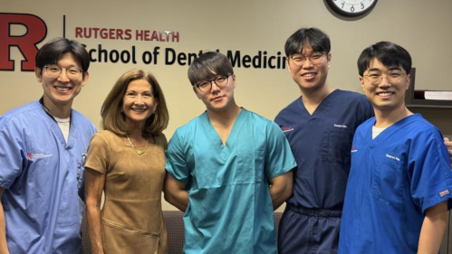 Group photo of students from Seoul National University and School of Dental Medicine