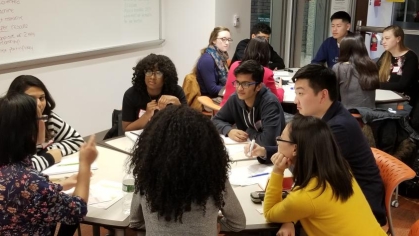 Students around a table to RU-Fit course