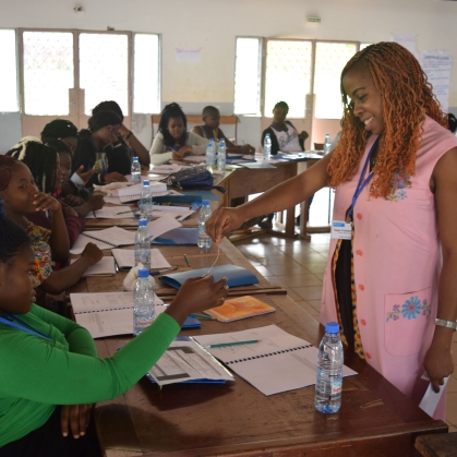 women teaching a group of students