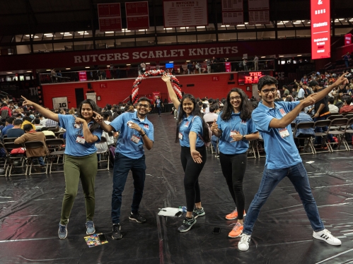 Rutgers international students at basketball arena