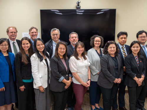 Group photo of Rutgers faculty engaging with National Taipei University