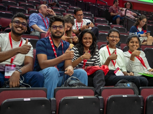 Five students in the arena for International Student Orientation