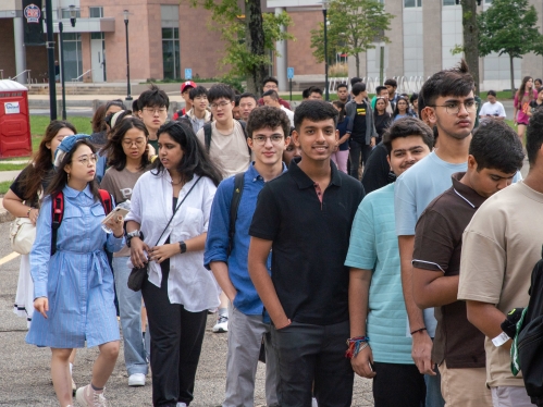 Students lining up for International Student Orientation, Fall 2023