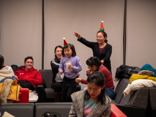 Rutgers international scholar and child at reception