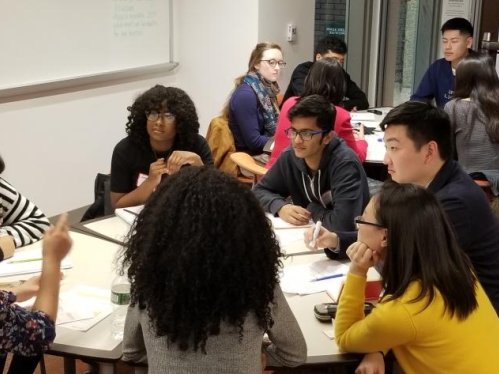 Students around a table to RU-Fit course