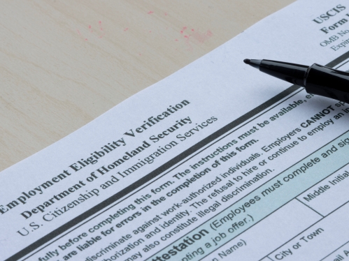 Closeup of Form I-9, Employment Eligibility Verification, issued by the U.S. Citizenship and Immigration Services, an agency of the Department of Homeland Security. 