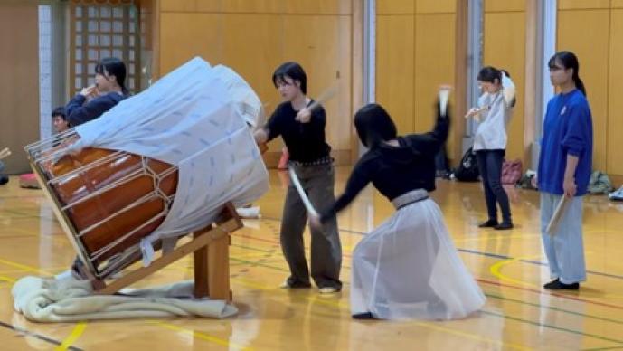 Students playing drums at Akita University