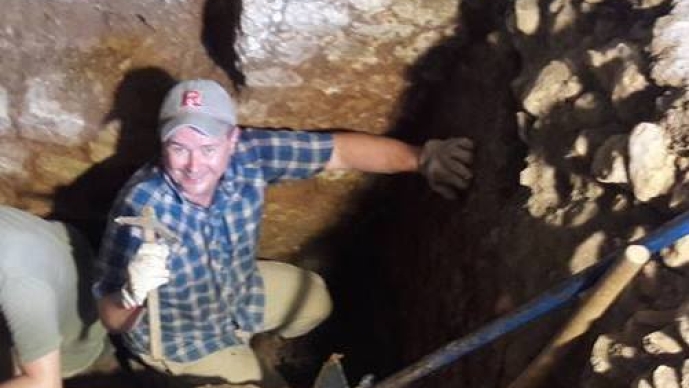 Gary Farney in an excavation