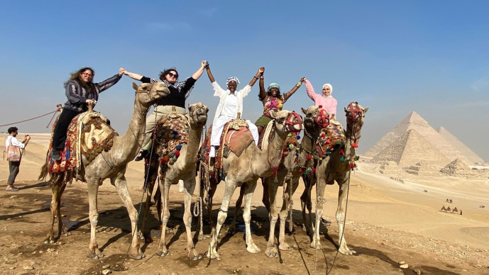 Students on camels in Egypt