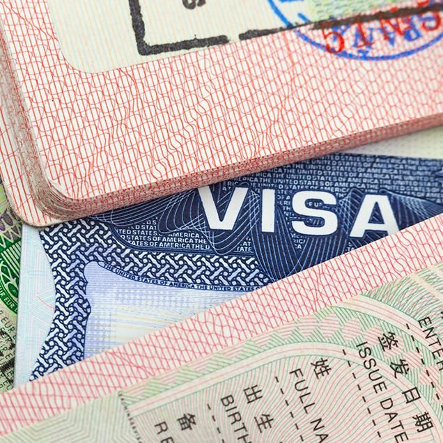 Rutgers Global - Maintaining F-2 or J-2 Visa Status, assortment of scattered visa paperwork, colorful