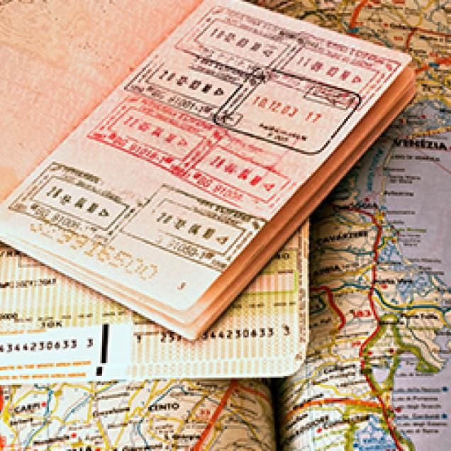 Passport open to visa stamp page