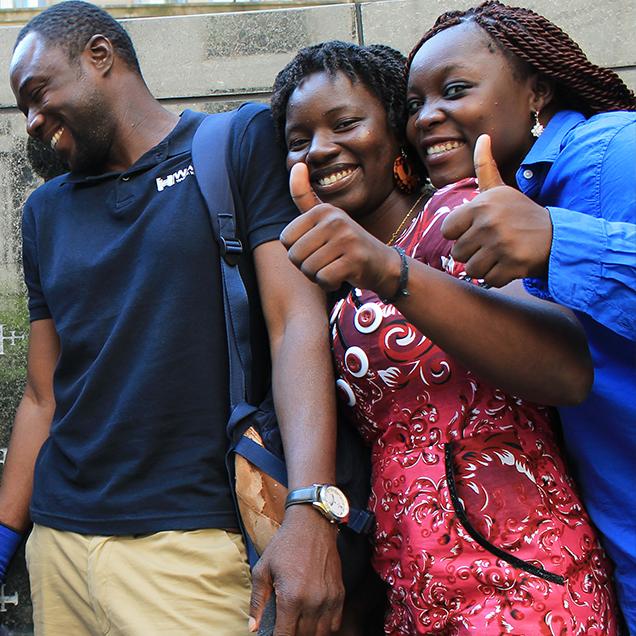 Rutgers Global – Mandela Washington Fellowship, three fellows pose during a field trip