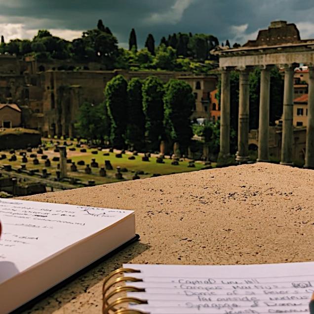 Student taking notes in Italy